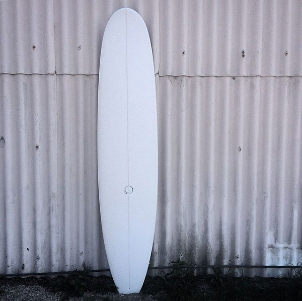 white on white 9'3 log surfboard
